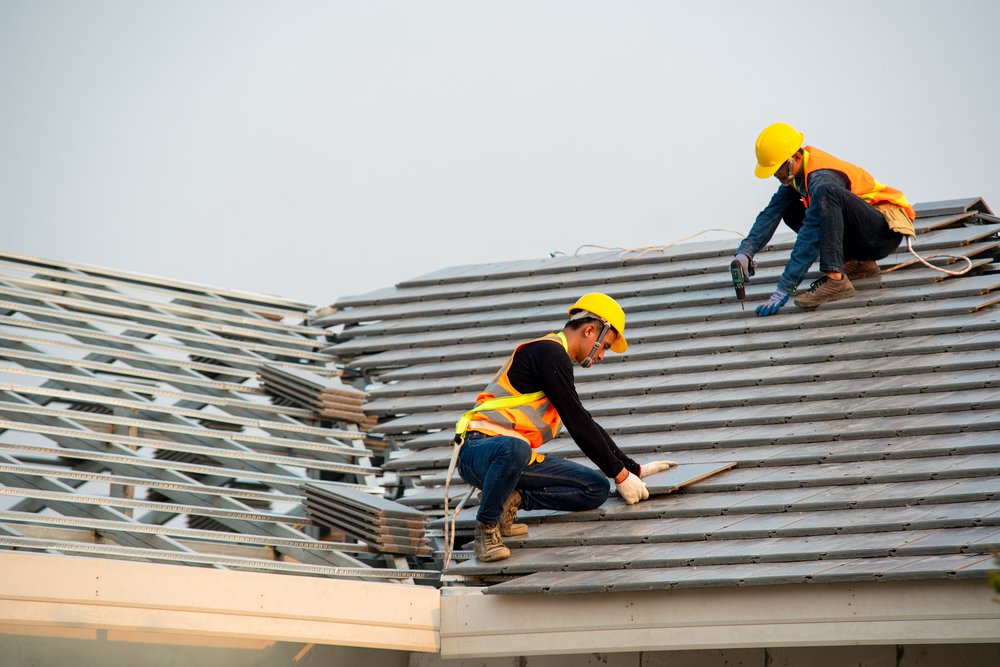 Professional roofing team at work