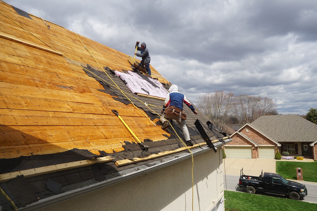 Storm damage roof repair in progress